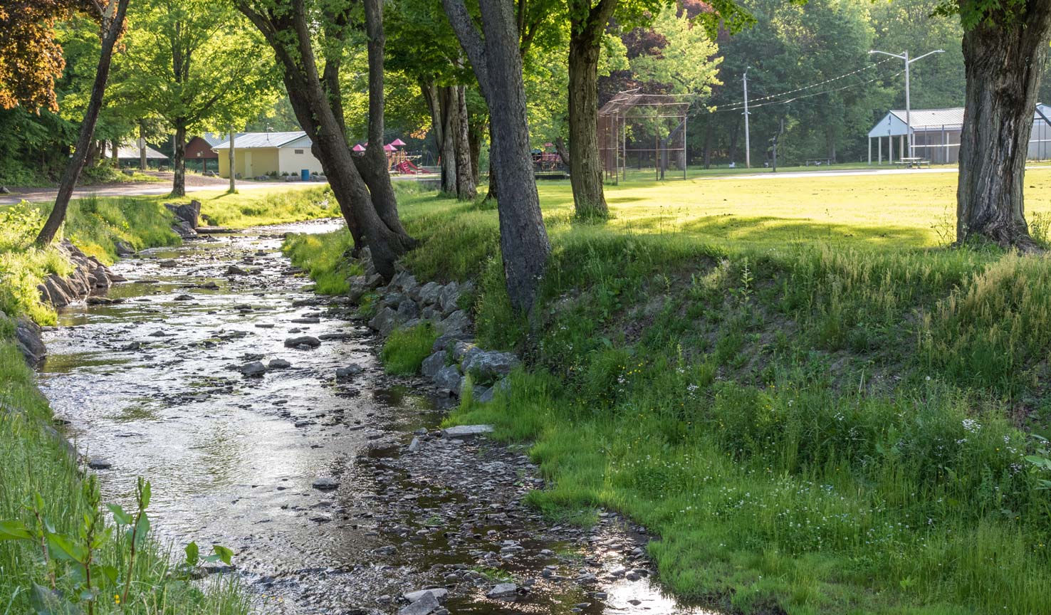 A creek as it cuts through a park